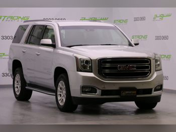 GMC  Yukon  SLE  2015  Automatic  220,000 Km  8 Cylinder  Rear Wheel Drive (RWD)  SUV  Silver