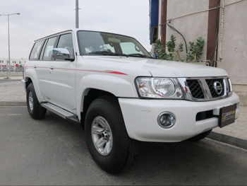 Nissan  Patrol  Safari  2022  Manual  65,000 Km  6 Cylinder  Four Wheel Drive (4WD)  SUV  White  With Warranty
