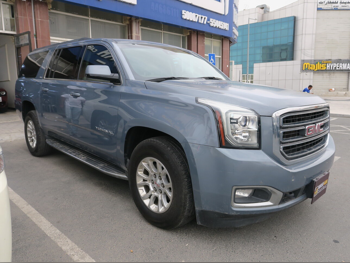 GMC  Yukon  XL  2016  Automatic  267,000 Km  8 Cylinder  Four Wheel Drive (4WD)  SUV  Sky Blue