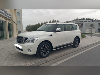 Nissan  Patrol  Platinum  2015  Automatic  143,000 Km  8 Cylinder  Four Wheel Drive (4WD)  SUV  White