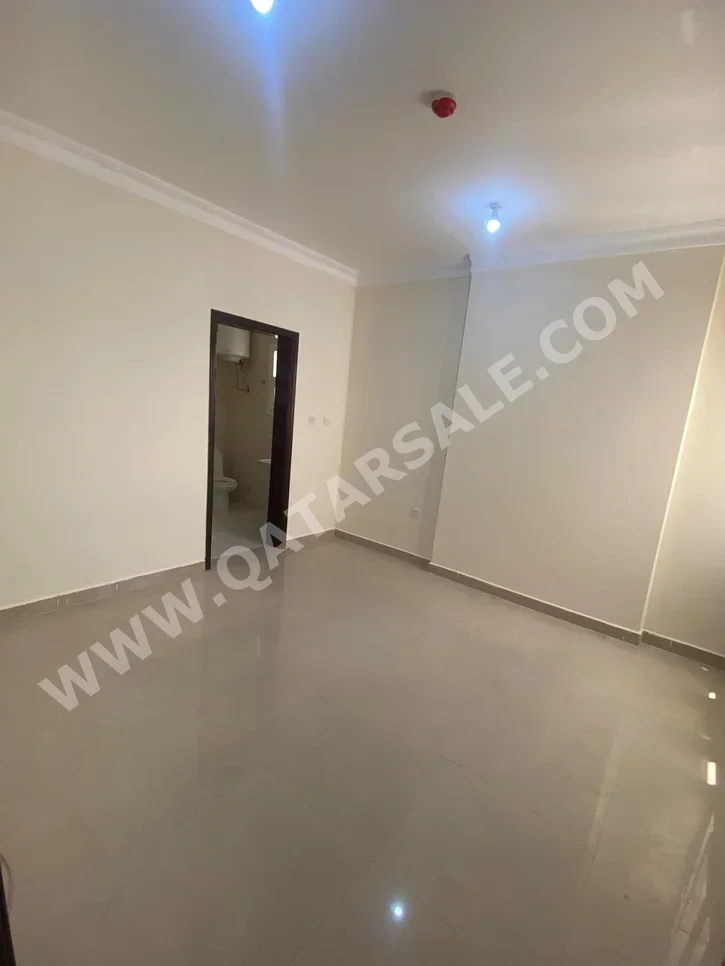 2 Bedrooms  Apartment  For Rent  in Doha -  Old Airport  Not Furnished
