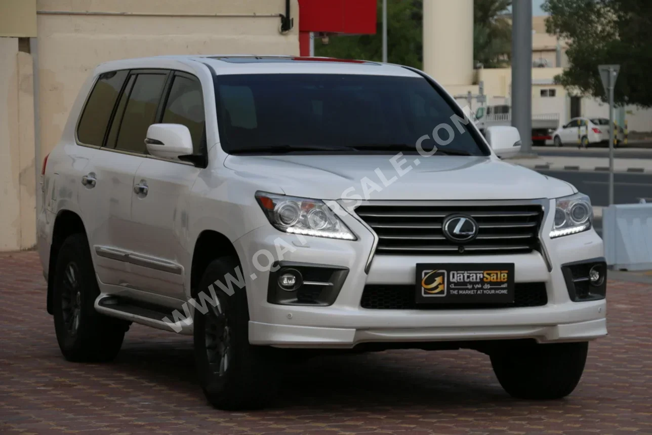 لكزس ال اكس 570 2014 اوتوماتيك 321,000 كم 8 سلندر دفع رباعي اس يو في أبيض