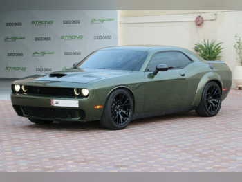 دودج  تشالنجر  2016  اوتوماتيك  48,000 كم  8 سلندر  دفع خلفي  كوبيه \ سبورت  أخضر عشبي