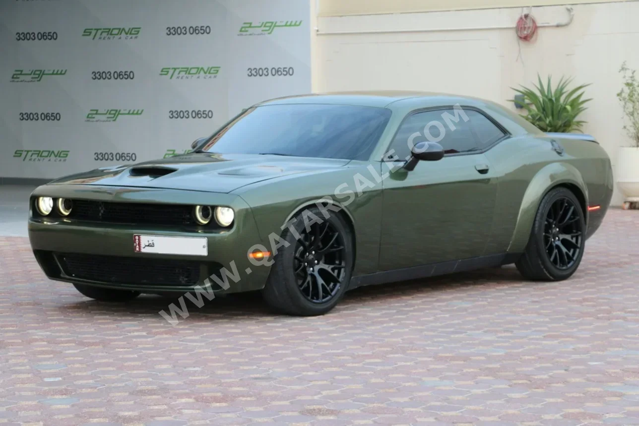 دودج  تشالنجر  2016  اوتوماتيك  48,000 كم  8 سلندر  دفع خلفي  كوبيه \ سبورت  أخضر عشبي
