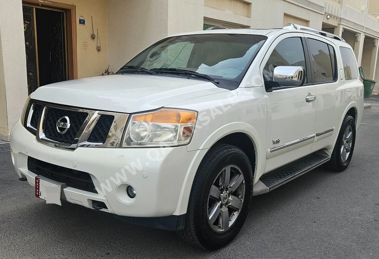 نيسان أرمادا ال اي 2013 اوتوماتيك 167,000 كم 8 سلندر دفع رباعي اس يو في أبيض
