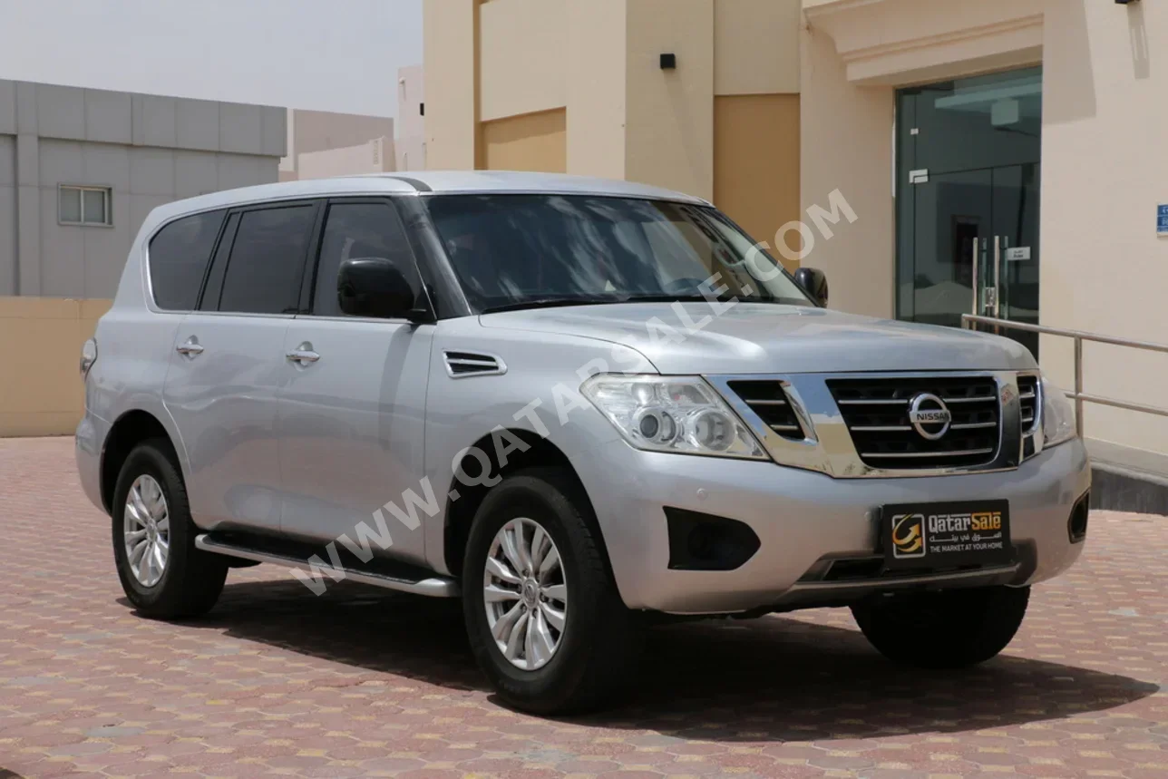Nissan  Patrol  XE  2019  Automatic  130,000 Km  6 Cylinder  Four Wheel Drive (4WD)  SUV  Silver