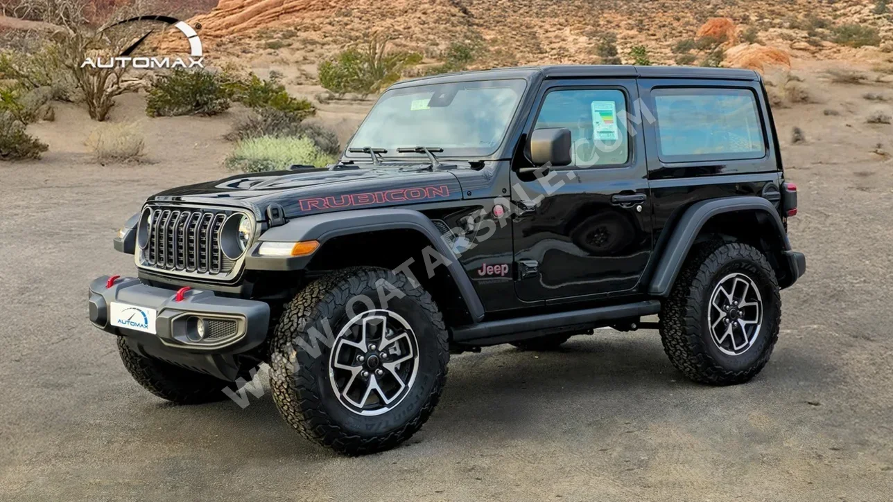 جييب رانجلار روبيكون 2025 اوتوماتيك 0 كم 4 سلندر دفع رباعي اس يو في أسود تحت الضمان