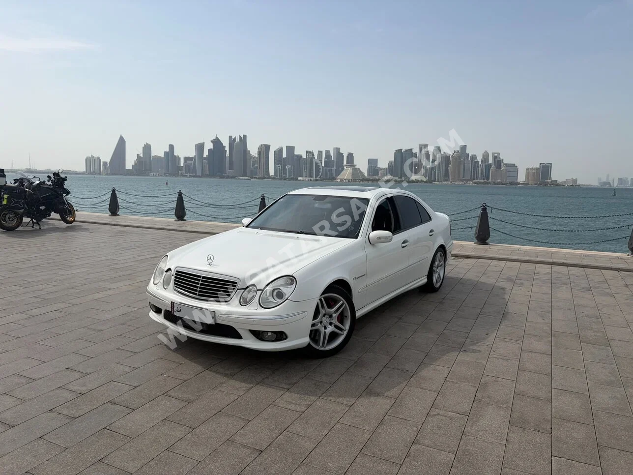 Mercedes-Benz  E-Class  55 AMG  2005  Automatic  135,500 Km  8 Cylinder  Rear Wheel Drive (RWD)  Sedan  White