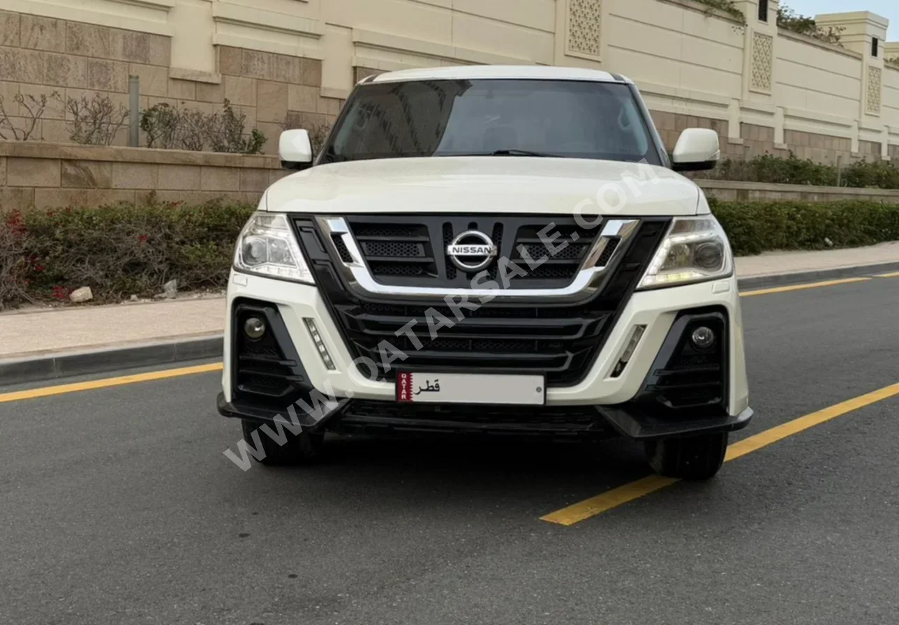 Nissan  Patrol  SE  2019  Automatic  176,000 Km  6 Cylinder  Four Wheel Drive (4WD)  SUV  White