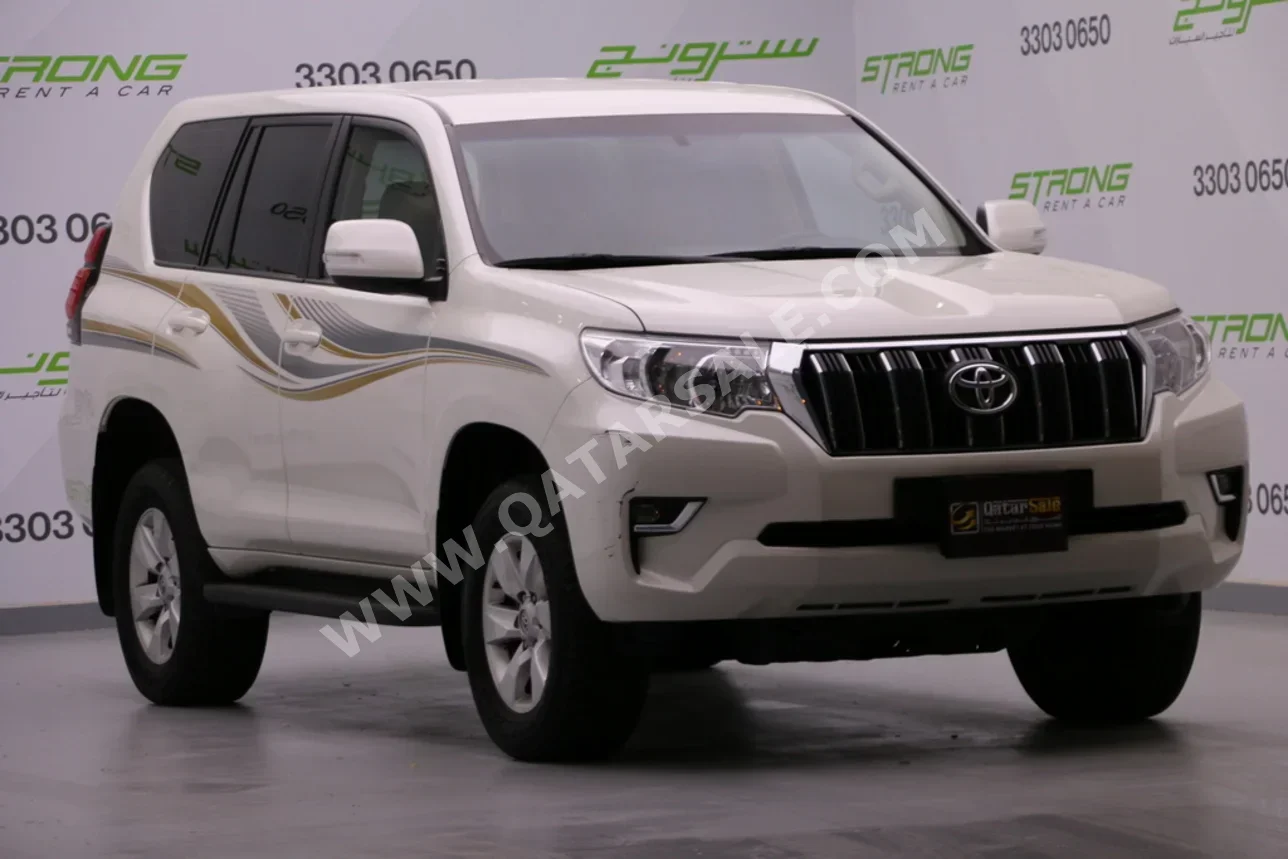 تويوتا برادو 2023 اوتوماتيك 58,000 كم 4 سلندر دفع رباعي اس يو في أبيض تحت الضمان