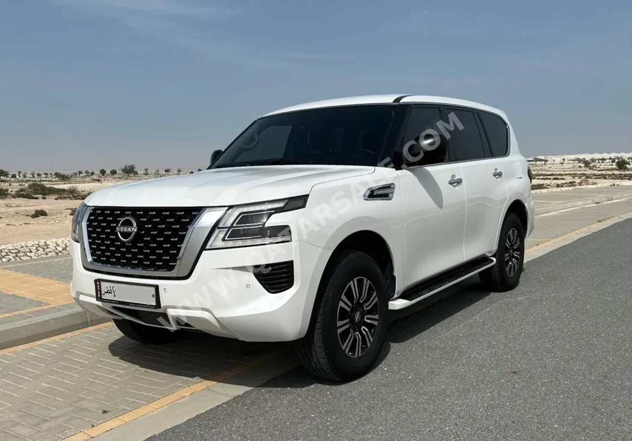 Nissan  Patrol  XE  2022  Automatic  122,206 Km  6 Cylinder  Four Wheel Drive (4WD)  SUV  White