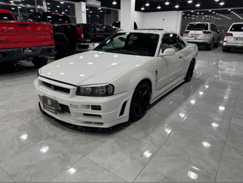 Nissan  GT-R  Nismo  1999  Manual  111,000 Km  4 Cylinder  Rear Wheel Drive (RWD)  Coupe / Sport  White