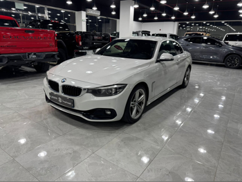 BMW  4-Series  420 I  2019  Automatic  85,000 Km  4 Cylinder  Rear Wheel Drive (RWD)  Coupe / Sport  White