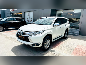 Mitsubishi  Pajero  Montero Sport  2019  Automatic  52,000 Km  6 Cylinder  Four Wheel Drive (4WD)  SUV  White  With Warranty