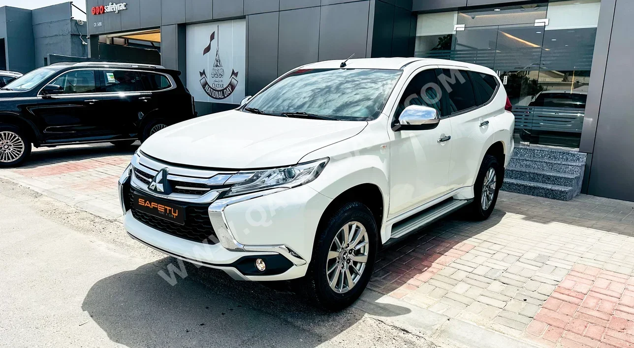 Mitsubishi  Pajero  Montero Sport  2019  Automatic  52,000 Km  6 Cylinder  Four Wheel Drive (4WD)  SUV  White  With Warranty