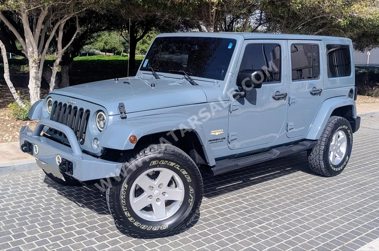 Jeep  Wrangler  Sahara  2014  Automatic  103,000 Km  6 Cylinder  Four Wheel Drive (4WD)  SUV  Blue and Gray