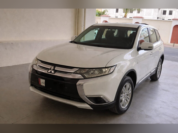 ميتسوبيشي  أوت لاندر  2016  اوتوماتيك  179,000 كم  4 سلندر  دفع رباعي  اس يو في  أبيض