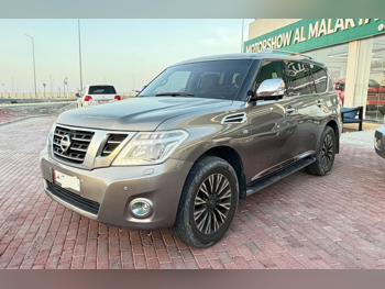 Nissan  Patrol  Platinum  2014  Automatic  19,000 Km  8 Cylinder  Four Wheel Drive (4WD)  SUV  Gray
