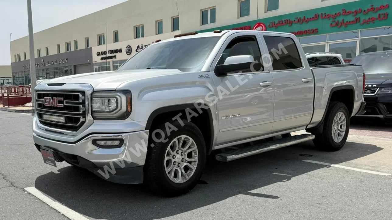 جي ام سي  سييرا  اس ال اي  2016  اوتوماتيك  379,000 كم  8 سلندر  دفع رباعي  بيكب  رمادي