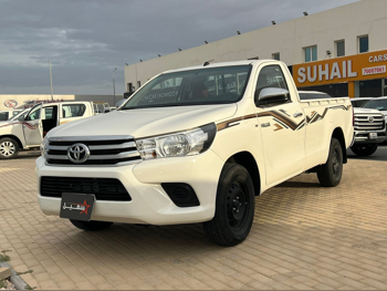 Toyota  Hilux  2024  Manual  13,000 Km  4 Cylinder  Rear Wheel Drive (RWD)  Pick Up  White