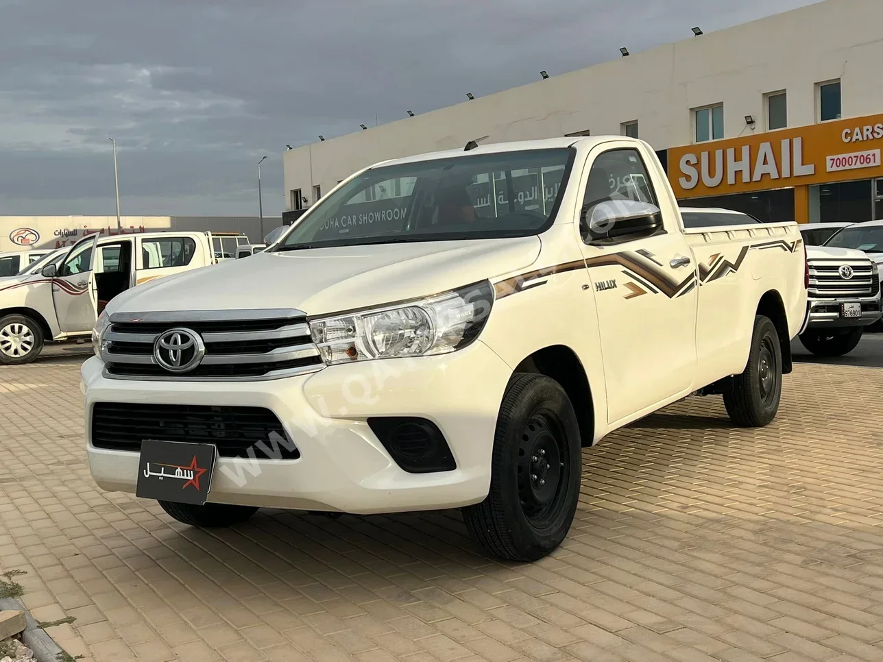 Toyota  Hilux  2024  Manual  13,000 Km  4 Cylinder  Rear Wheel Drive (RWD)  Pick Up  White