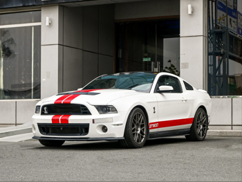 Ford  Shelby  GT 500  2011  Manual  149,000 Km  8 Cylinder  Rear Wheel Drive (RWD)  Coupe / Sport  White