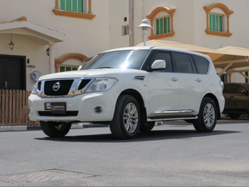 نيسان  باترول  ال اي  2013  اوتوماتيك  440,000 كم  8 سلندر  دفع رباعي  اس يو في  أبيض