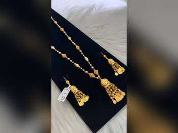 الذهب طقم  البحرين  نسائي  حسب الوزن  45.69 غرام  بدون حجر  ضمان الصيانة  توصيل مجاني  ذهب أصفر  عيار 21