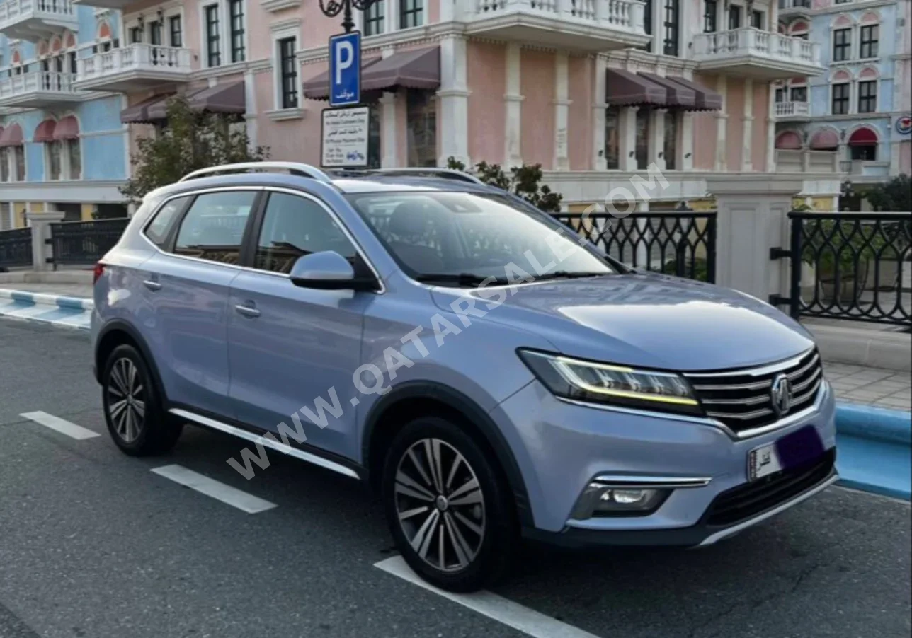 ام جي  ار اكس 5  2021  اوتوماتيك  130,000 كم  4 سلندر  دفع رباعي  اس يو في  أزرق و رمادي