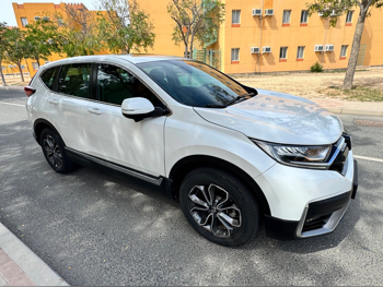 Honda  CRV  Touring  2022  Automatic  84,500 Km  4 Cylinder  All Wheel Drive (AWD)  SUV  White  With Warranty