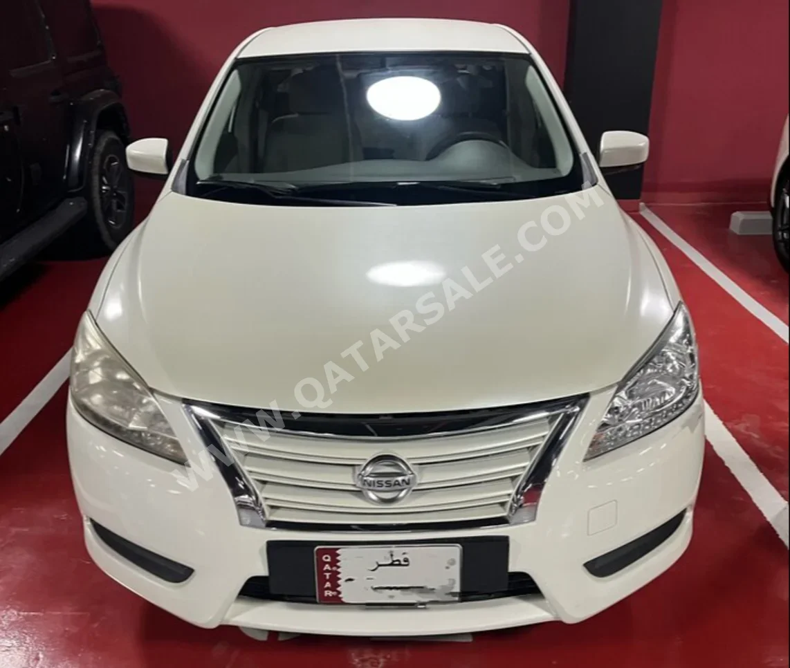 Nissan  Sentra  2015  Automatic  180,000 Km  4 Cylinder  Front Wheel Drive (FWD)  Sedan  White