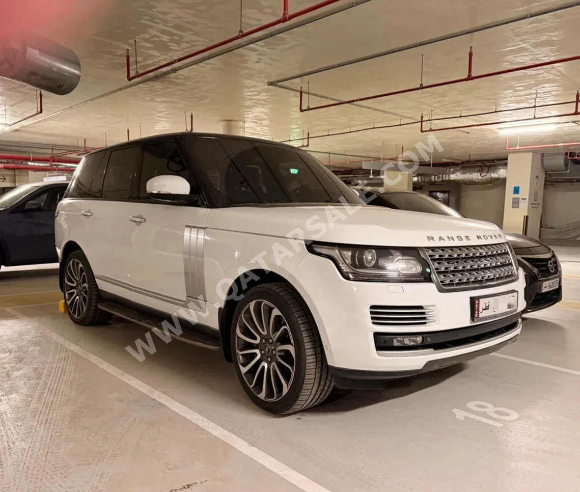Land Rover  Range Rover  Vogue  Autobiography  2014  Automatic  145,000 Km  8 Cylinder  Four Wheel Drive (4WD)  SUV  White
