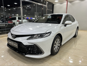 Toyota  Camry  LE  2023  Automatic  15,000 Km  4 Cylinder  Front Wheel Drive (FWD)  Sedan  White