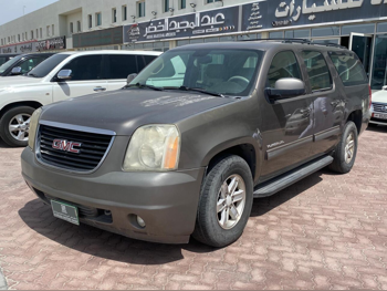GMC  Yukon  XL  2011  Automatic  183,000 Km  8 Cylinder  Four Wheel Drive (4WD)  SUV  Light Brown