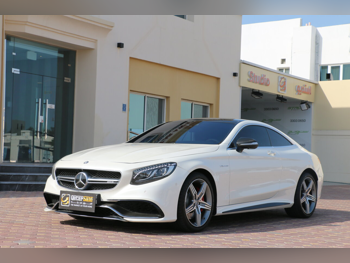 مرسيدس - بنز  اس - كلاس  63 AMG  2015  اوتوماتيك  60,500 كم  8 سلندر  دفع خلفي  كوبيه \ سبورت  أبيض