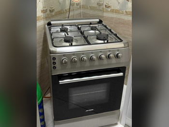 فرن مزدوج \  كهرباء و غاز  فضة