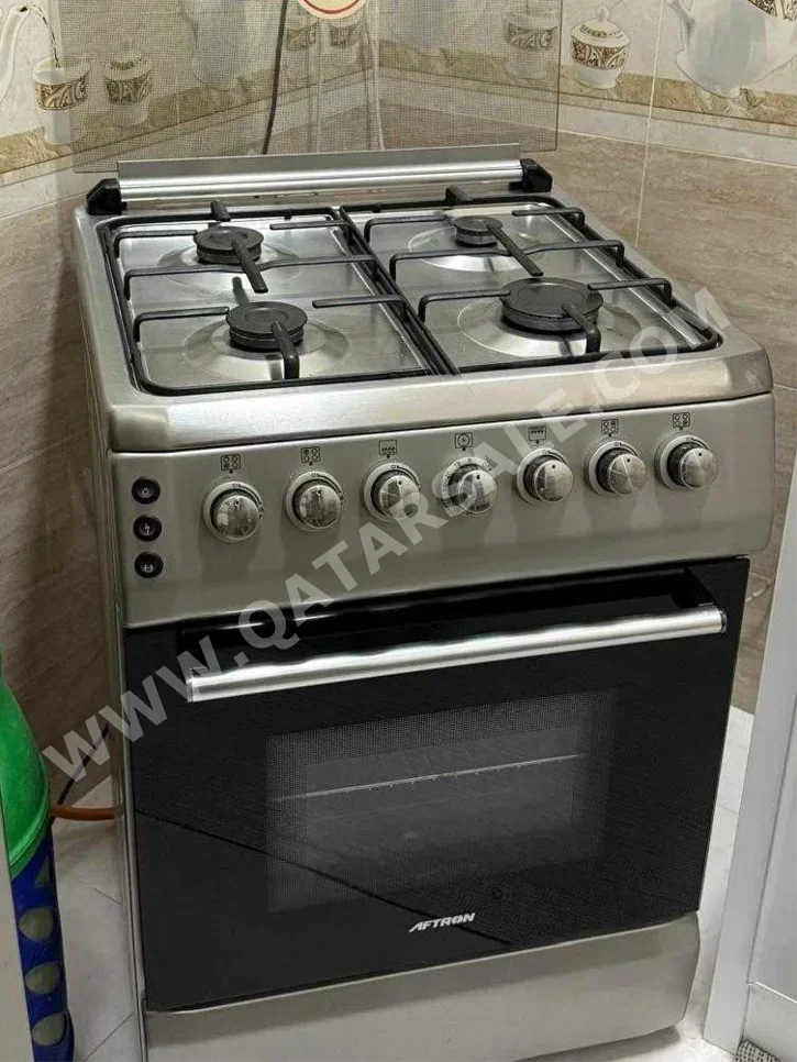 فرن مزدوج \  كهرباء و غاز  فضة