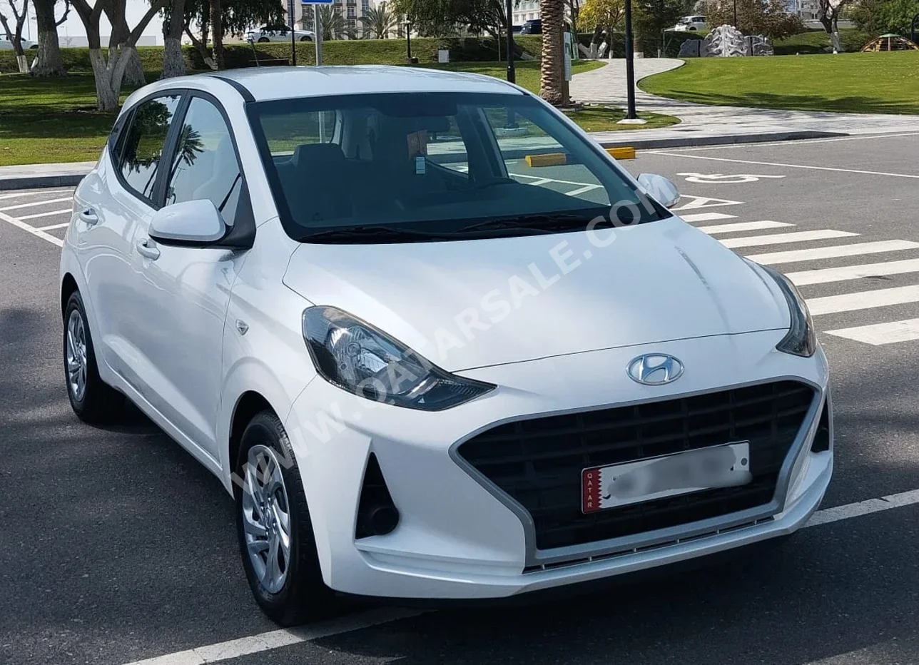 هيونداي  اي  10  2022  اوتوماتيك  97,000 كم  4 سلندر  سحب امامي  هاتشباك  أبيض