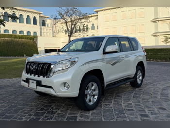 Toyota  Prado  TXL  2015  Automatic  70,000 Km  6 Cylinder  Four Wheel Drive (4WD)  SUV  White