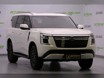 Nissan  Patrol  Titanium  2025  Automatic  20,000 Km  6 Cylinder  Four Wheel Drive (4WD)  SUV  Pearl  With Warranty