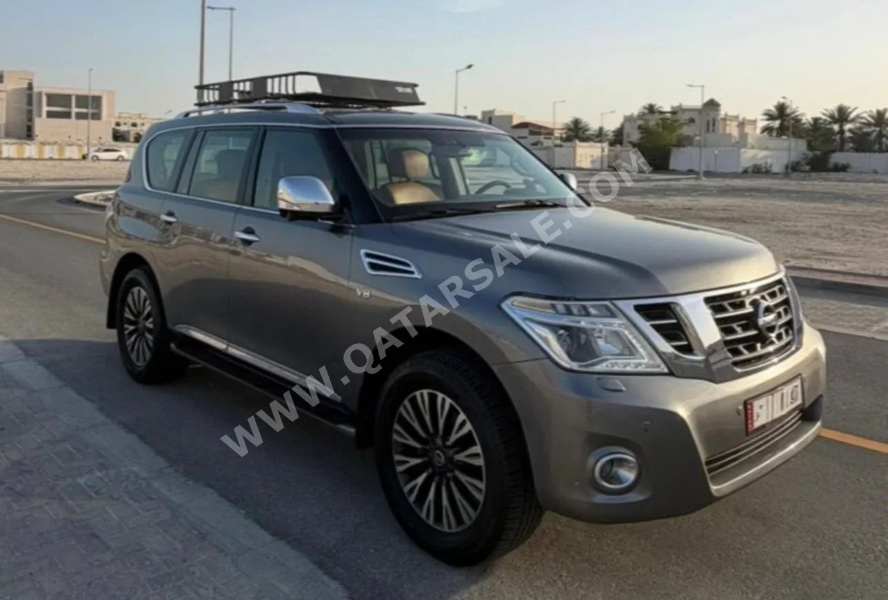 Nissan  Patrol  Platinum  2016  Automatic  121,727 Km  8 Cylinder  Four Wheel Drive (4WD)  SUV  Gray