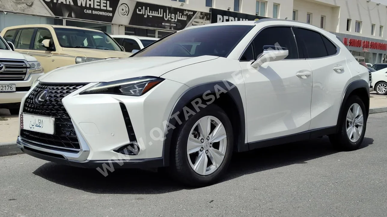 Lexus  UX  200  2023  Automatic  48,000 Km  4 Cylinder  All Wheel Drive (AWD)  SUV  White  With Warranty