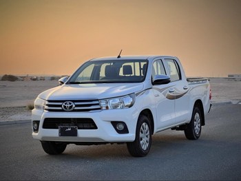 Toyota  Hilux  2019  Automatic  146,000 Km  4 Cylinder  Rear Wheel Drive (RWD)  Pick Up  White
