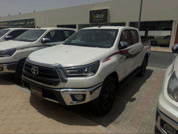 Toyota  Hilux  SR5  2023  Automatic  170,000 Km  4 Cylinder  Four Wheel Drive (4WD)  Pick Up  White