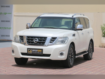 Nissan  Patrol  Platinum  2015  Automatic  290,000 Km  8 Cylinder  Four Wheel Drive (4WD)  SUV  White