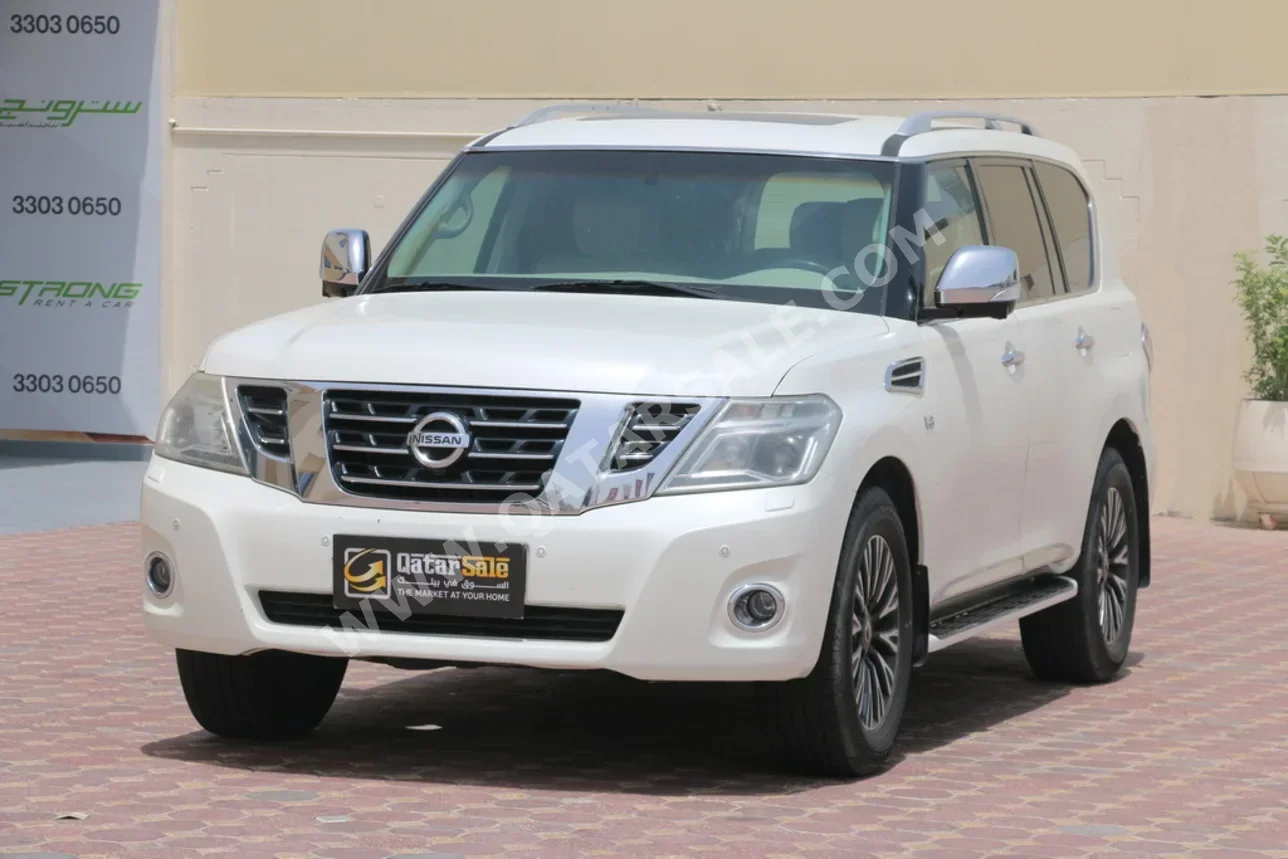 Nissan  Patrol  Platinum  2015  Automatic  290,000 Km  8 Cylinder  Four Wheel Drive (4WD)  SUV  White