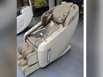 كرسي التدليك اللون البيج