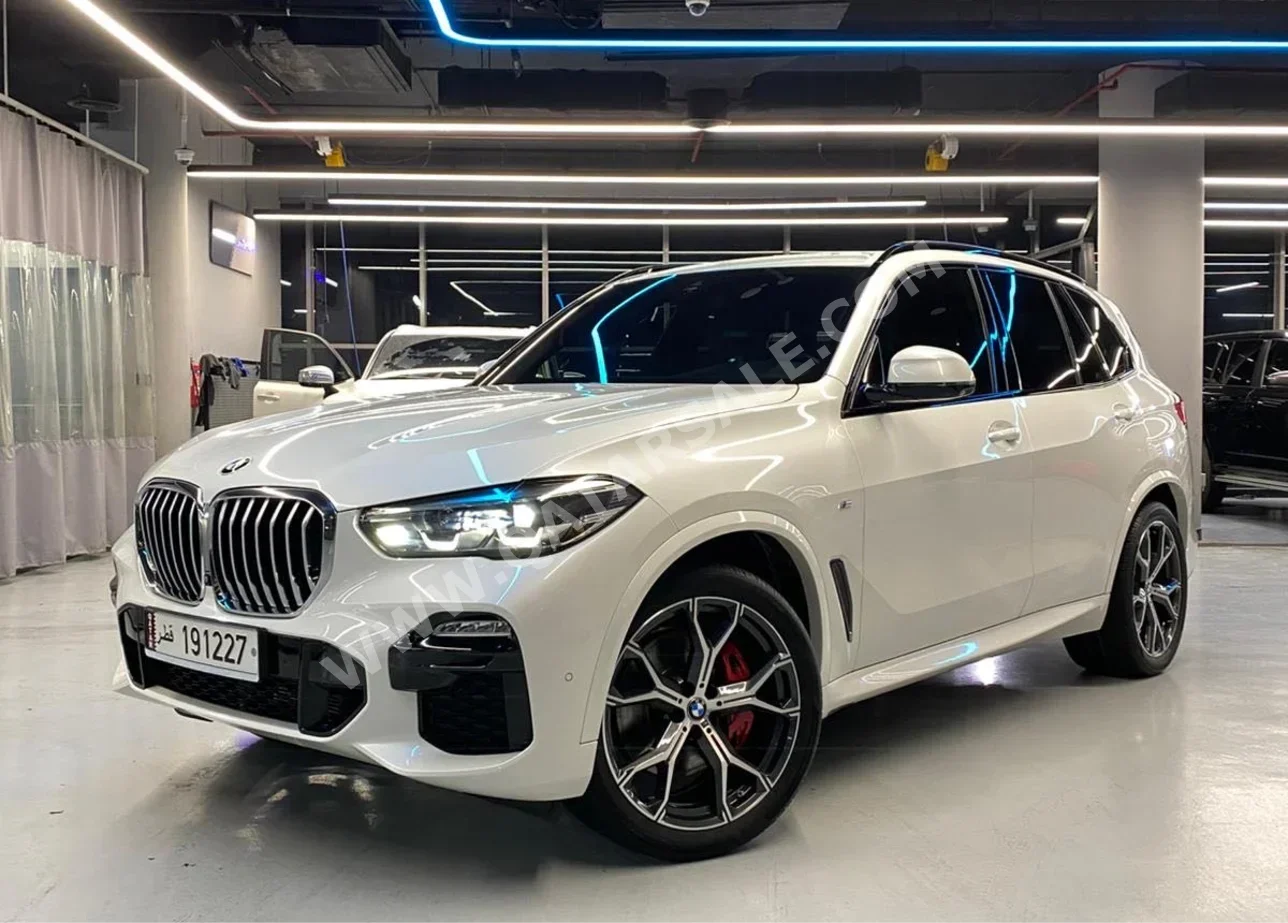 BMW  X-Series  X5 40i  2022  Automatic  23,000 Km  6 Cylinder  All Wheel Drive (AWD)  SUV  White  With Warranty