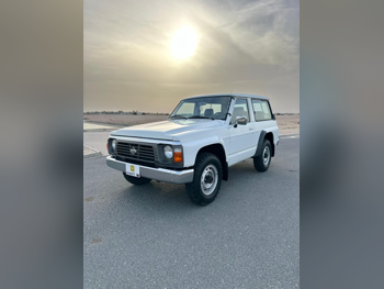 Nissan  Patrol  1995  Manual  158,000 Km  6 Cylinder  Four Wheel Drive (4WD)  SUV  White