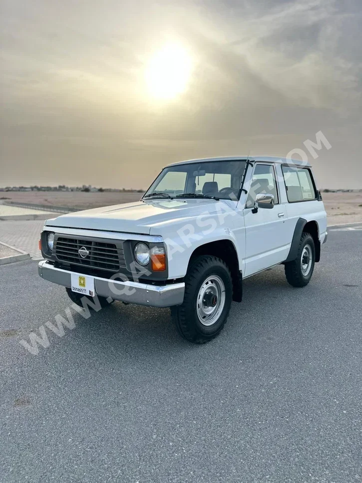 Nissan  Patrol  1995  Manual  158,000 Km  6 Cylinder  Four Wheel Drive (4WD)  SUV  White